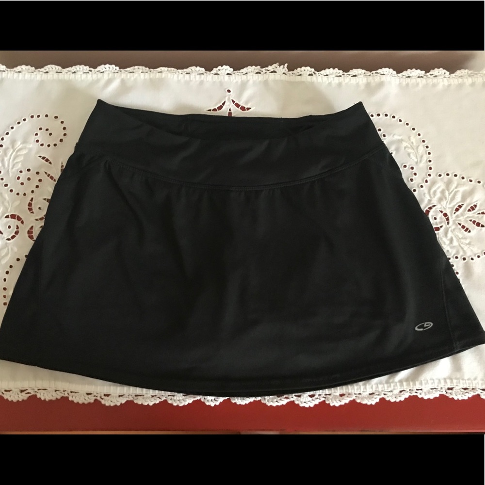 Champion golf/tennis or just running black skort.